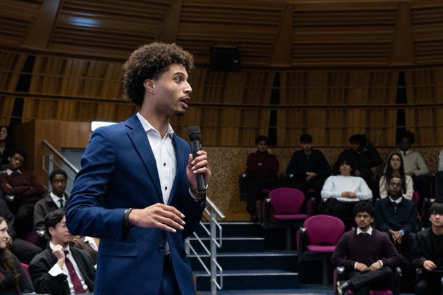 A speaker taking questions at a LEAF event